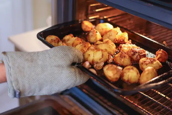 Roast potatoes are so much crispier if covered in 1 ingredient before going in oven