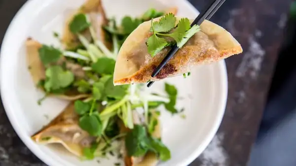 Beef Up Your Bowl Of Leafy Greens Using Frozen Potstickers