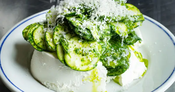 Raw Courgette Salad Over a Pot of Ricotta