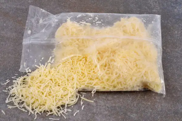 Grated Emmental cheese isn't just cheese; manufacturers also add potato