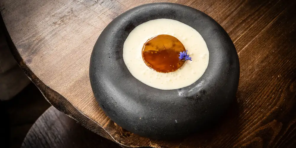 Buckwheat honey cake with buckwheat chocolate and cultured cream