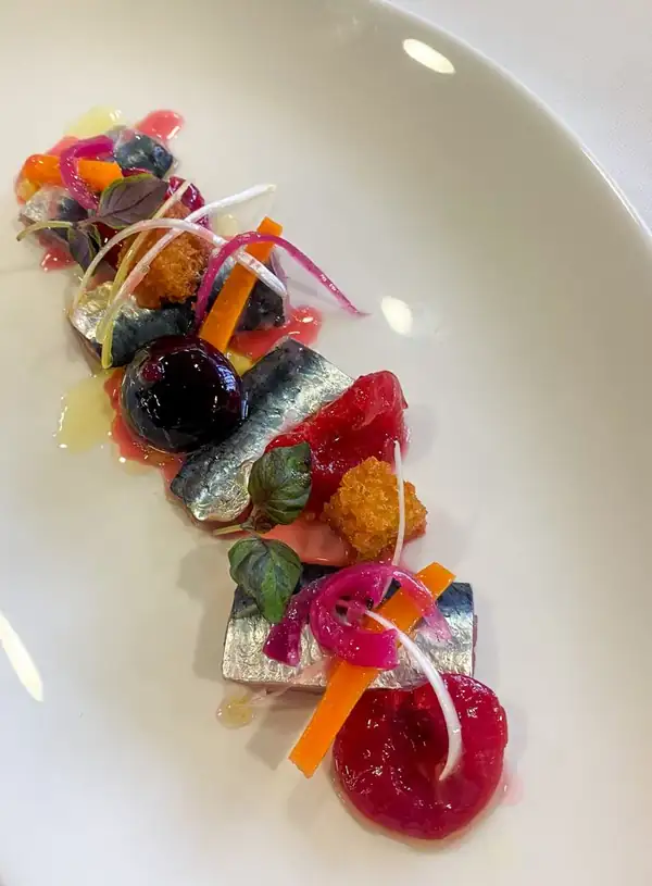 Pickled sardines and cherries