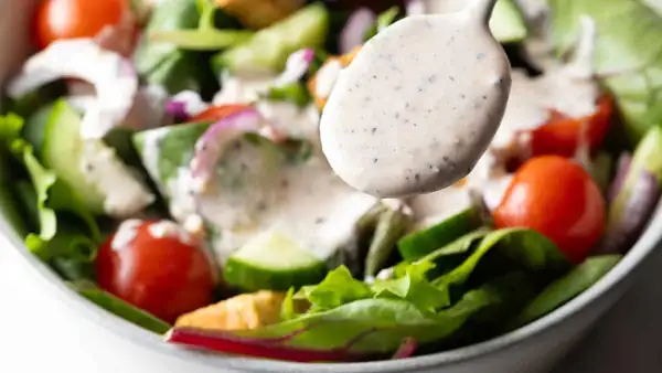 The Creamiest Parmesan Peppercorn Dressing You've Ever Tasted