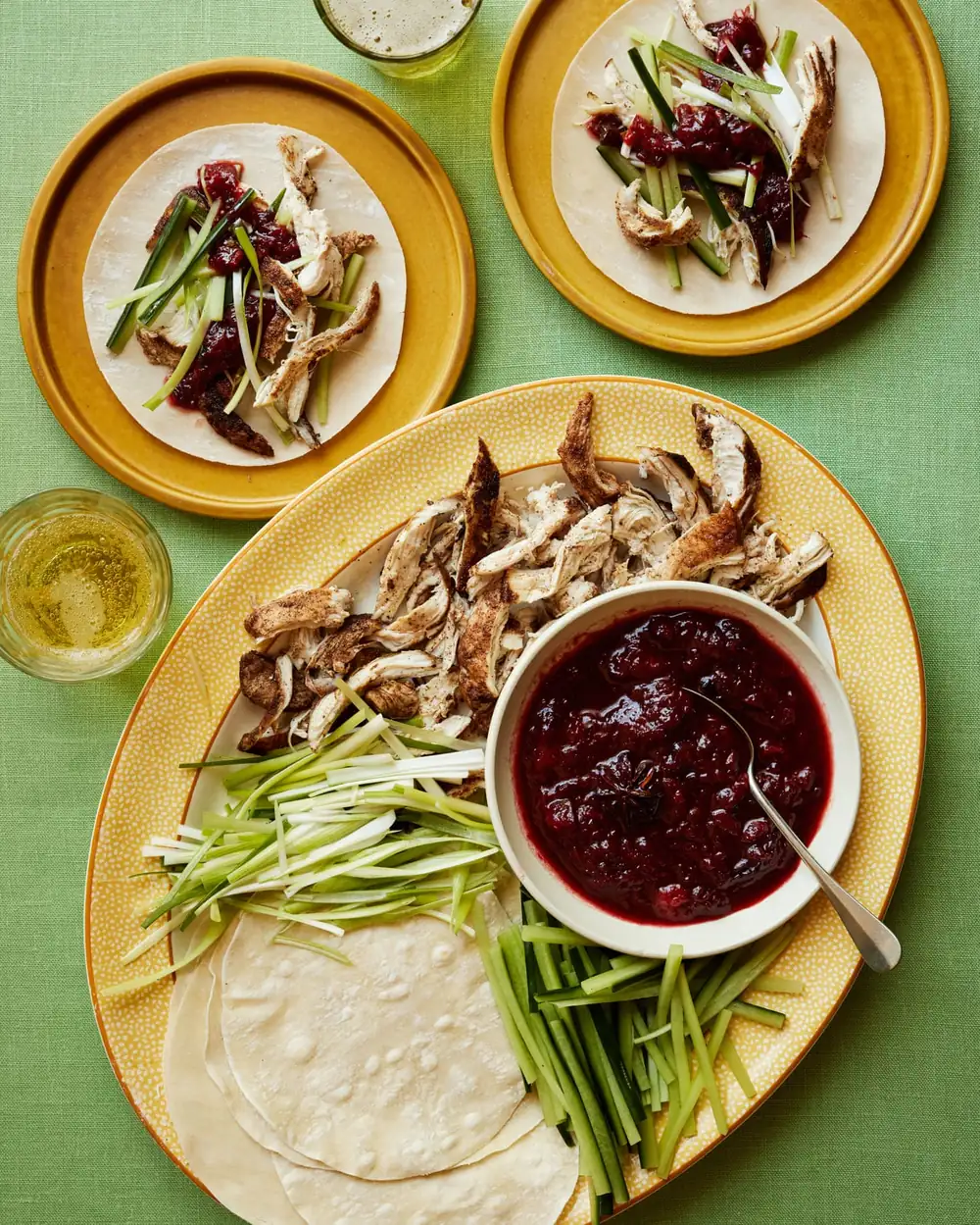 Georgina Hayden’s quick and easy recipe for spiced sticky chicken with plums and pancakes