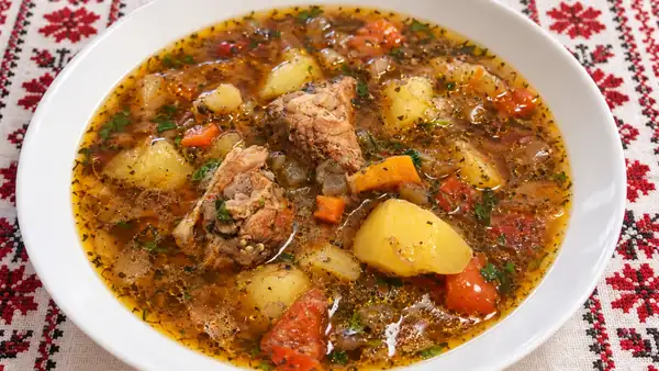 Pork stew with eggplant, potatoes and red peppers