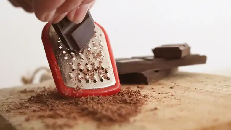 The Trick To Grating Chocolate Without Causing A Melted Mess
