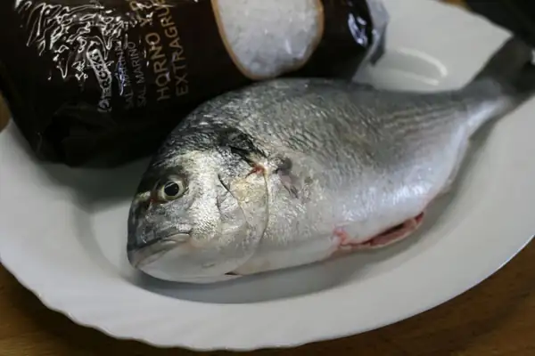 Sea bream baked in salt and oven