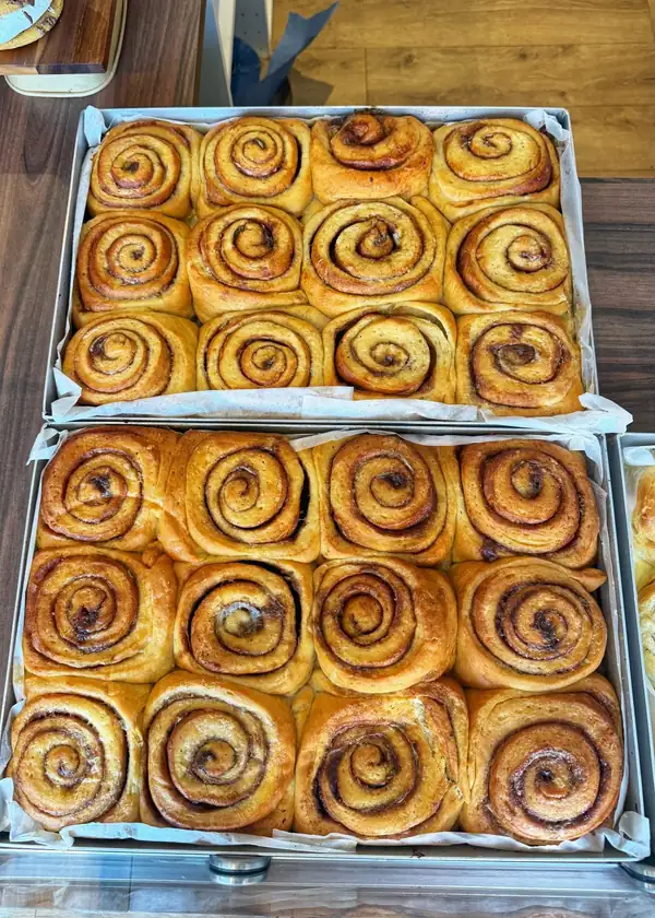 A bakery serving giant NYC-style cookies and fluffy cinnamon buns has just opened in Leeds