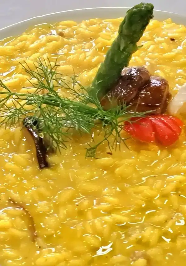 Saffron risotto with mushrooms and Taleggio cream