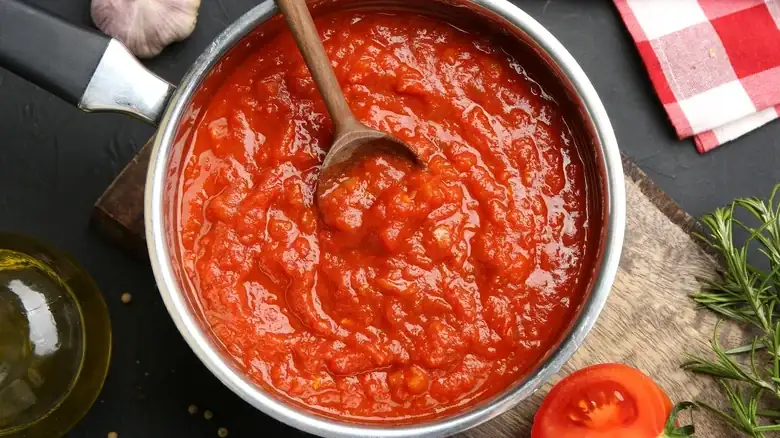 The Canned Ingredient That Brings Rich Flavor To Any Tomato Sauce