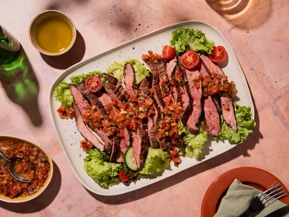 Grilled flank steak with spicy BBQ salsa