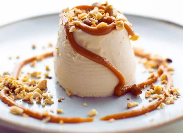 Hazelnut Panna Cotta with Caramel Sauce