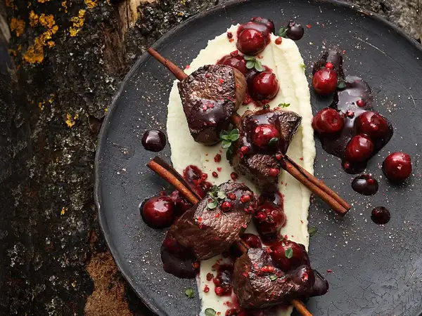 Venison with sour cherry and pepper syrup
