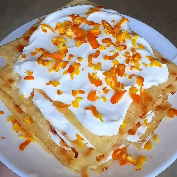 Orange dessert with Carasatu bread