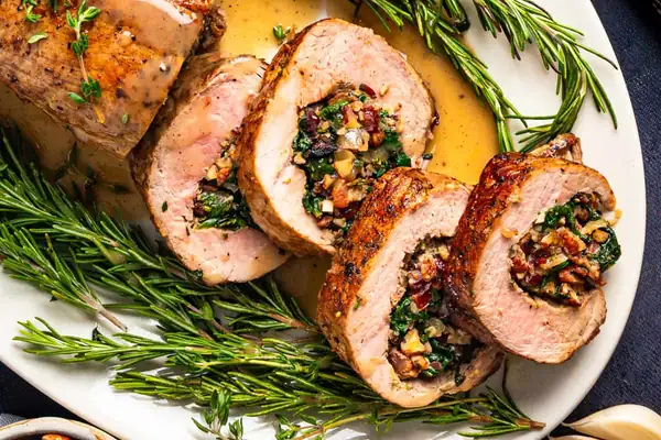 Your Easter Main Course Search is over! Make Stuffed Pork Tenderloin with Spinach, Bacon, Pecans, and Cranberries!