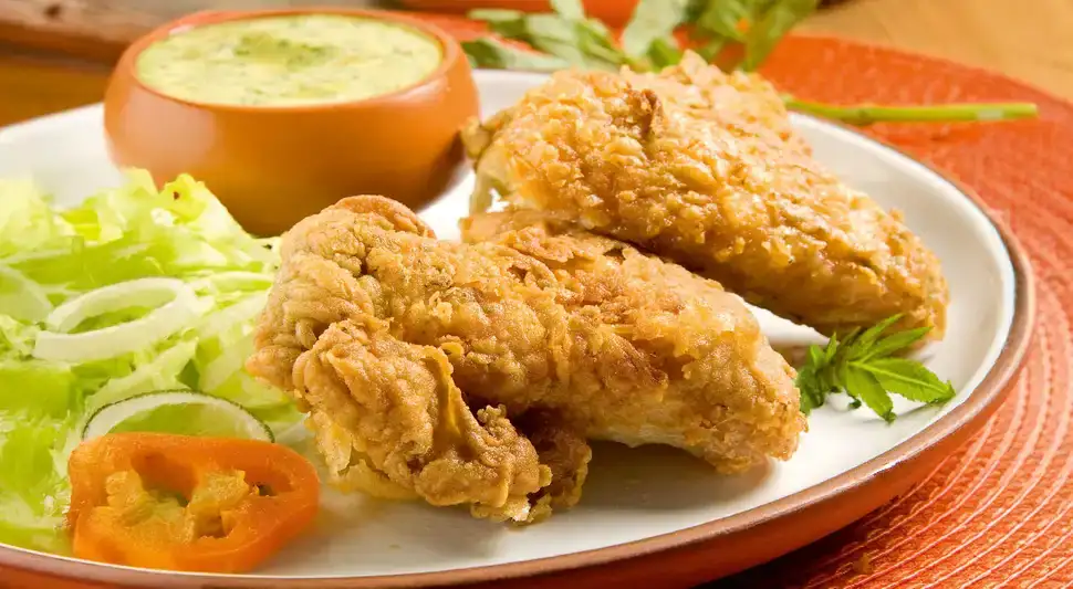 Broasted chicken wings with huacatay sauce
