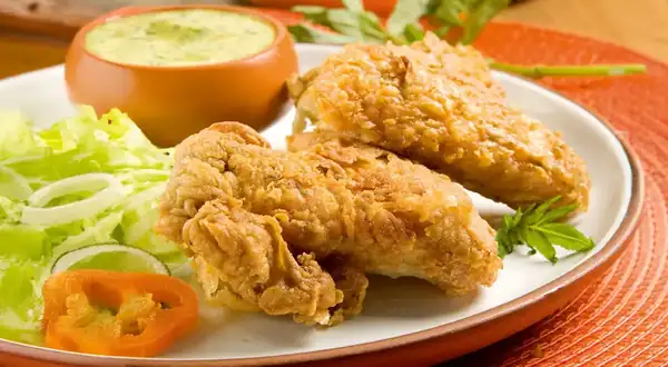 Broasted chicken wings with huacatay sauce