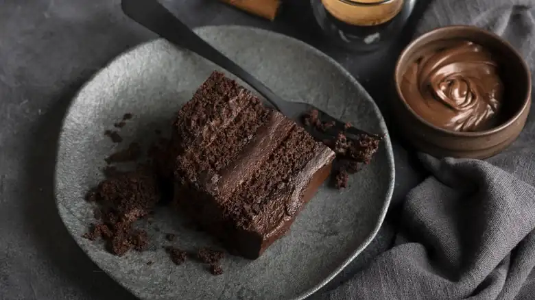 The Unexpected Condiment That Adds Color And Flavor To Chocolate Cake