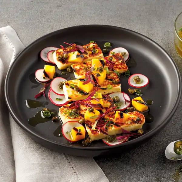 Halloumi and grilled mangoes with fried capers