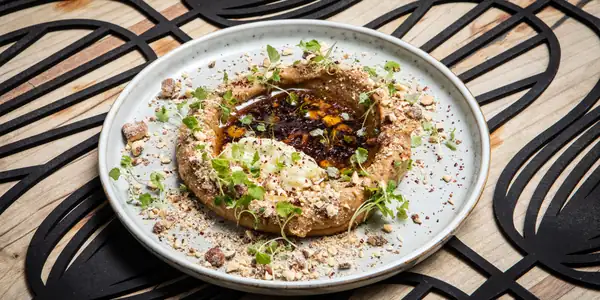 Parsnip mutabal, preserved lime and smoked almonds