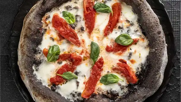 Who won the second semi-final of the Pizza Bit Competition 2026?