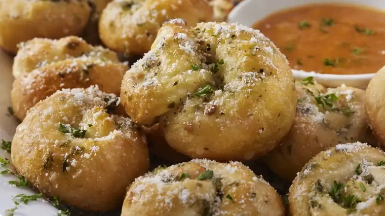 Garlic Knots Are The Ideal Bread For Your Chicken Parm Sandwich